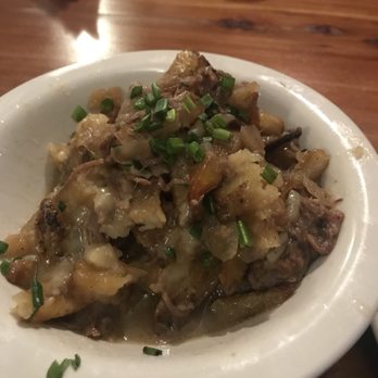 Nadeen's Hermitage Haven - Poutine. French fries with cheese curds and short rib gravy (with chunks of short ribs) - Breakfast & Brunch Near Me - Hermitage, Tennessee Nadeen's Hermitage Haven - Poutine. French fries with cheese curds and short rib gravy (with chunks of short ribs) - Breakfast & Brunch Near Me - Hermitage, Tennessee