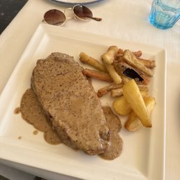 Veal Entrecotte with mustard sauce.
