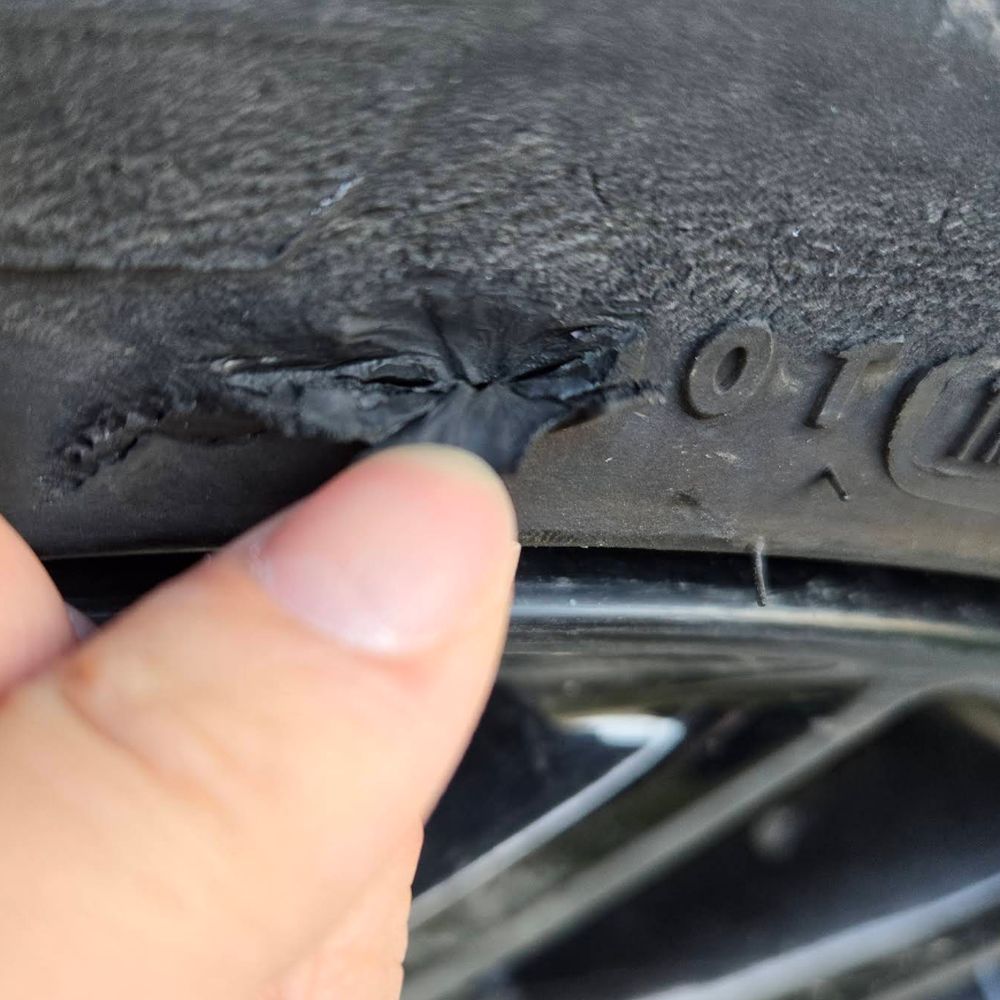 Dunn Tire & Auto - According to Dunn Tire, this was curb damage from less then 1 day of driving on a brand new tire - Tires Near Me - Erie, Pennsylvania