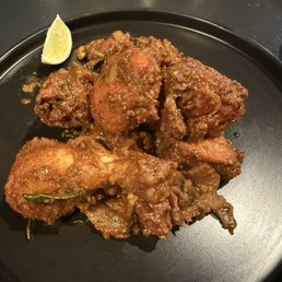 CHICKEN VEPUDU - tender bone-in chicken stir-fried with a medley of spices and curry leaves CHICKEN VEPUDU - tender bone-in chicken stir-fried with a medley of spices and curry leaves