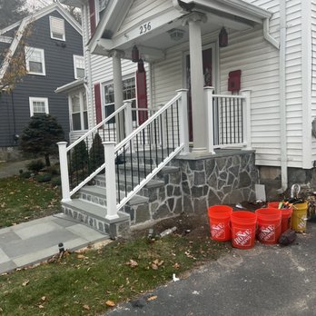Hernandez handyman  - wo buckets outside a house - General Contractors Near Me