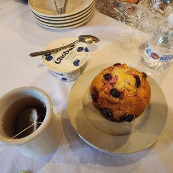 Glen Cove Hotel & Restaurant - Hot tea, yogurt, water, and a cranberry muffin (Continental breakfast) - Hotels Near Me - Onset, Massachusetts Glen Cove Hotel & Restaurant - Hot tea, yogurt, water, and a cranberry muffin (Continental breakfast) - Hotels Near Me - Onset, Massachusetts