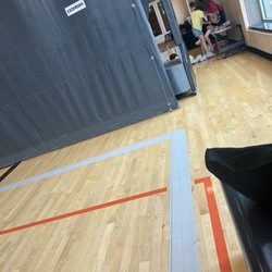 Life Time - Some of the summer camp kids using the basketball court to color.