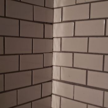 Elite Enterprise - the corner of a tiled bathroom - General Contractors Near Me Elite Enterprise - the corner of a tiled bathroom - General Contractors Near Me