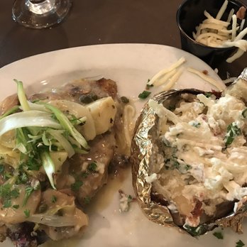Finley Point Grill - Bone in chicken and yummy loaded baked potato , very good - Seafood Near Me - Polson, Montana