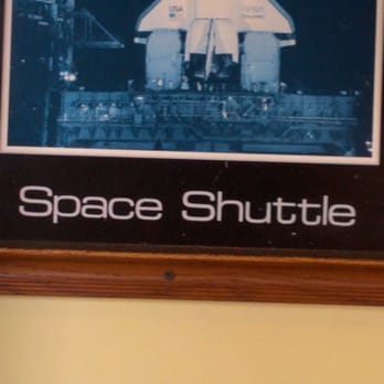 IHOP - Frame on pic of space shuttle ..notice under words space shuttle frame is filthy - Breakfast & Brunch Near Me - COCOA BEACH, Florida