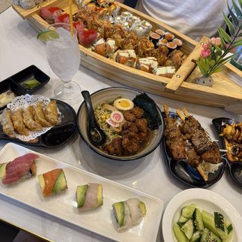 Sushi Loop - Rainbow roll, Addictive Cucumber, Gyoza(6Pcs), Chicken Yakitori(2Pcs) - Sushi Bars Near Me - Chicago, Illinois Sushi Loop - Rainbow roll, Addictive Cucumber, Gyoza(6Pcs), Chicken Yakitori(2Pcs) - Sushi Bars Near Me - Chicago, Illinois