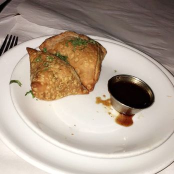 Bombay Darbar - VEGETABLE SAMOSA - 2 Pcs of crispy patties stuffed with seasoned potatoes and green peas. - Indian Near Me - Miami, Florida Bombay Darbar - VEGETABLE SAMOSA - 2 Pcs of crispy patties stuffed with seasoned potatoes and green peas. - Indian Near Me - Miami, Florida