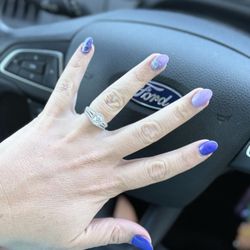 Escape Nail Spa - This is a picture on Sunday September 13th, where if you zoom you will see where the thumb is off, all cuticles are wrong. Paint on fingers.