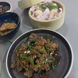 Tampopo - Sichuan pork belly, prawn dim sum (har gow), fried chicken skin crackling, prawn crackers (shrimp chips)