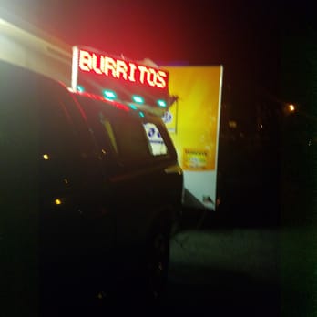 TChuvis - a car parked in front of a burritos sign - Food Trucks Near Me - Sunnyvale, California TChuvis - a car parked in front of a burritos sign - Food Trucks Near Me - Sunnyvale, California
