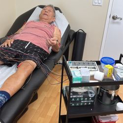 Leon Acupuncture - My dad in process of acupunture.