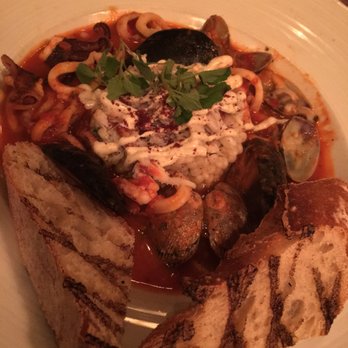 The Fly Trap - Seafood stew over couscous - Bars Near Me - San Francisco, California
