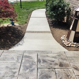 Stamped concrete stoop.