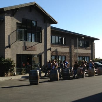 Sante Adairius Rustic Ales - Building entrance and outdoor seating in the parking lot. - Breweries Near Me - Capitola, California