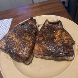 Fratelli Freschi Seafood - Out of the smoking hot black cast iron pan loaded with paul prisoner blackened magic