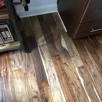Rem Pro Remodeling - We were promised and paid for wood matching the bottom half of this picture but the installed wood (top half) is completely different. - General Contractors Near Me - San Carlos, California