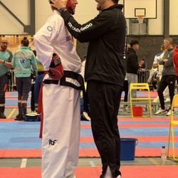 JSK TaeKwonDo - Mr Josh whom Nicholas grew up with at JSK coaching him through a rough spot in sparring.