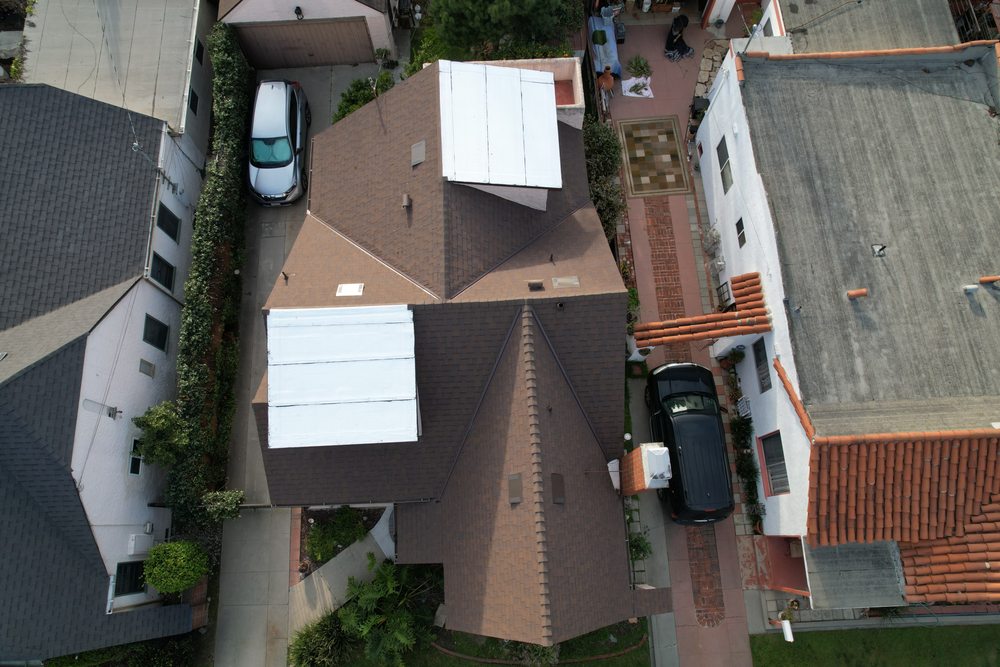 Slide of Enriquez Roofing