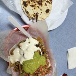 San Pancho Taqueria - Nachos with chicken and plain cheese quesadilla.