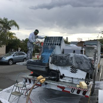 Pool Effects - Mini-pebble being mixed to be pumped to pool. - Pool & Hot Tub Service Near Me - Anaheim, California Pool Effects - Mini-pebble being mixed to be pumped to pool. - Pool & Hot Tub Service Near Me - Anaheim, California