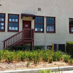 Corona Art Association - Sign in a window.