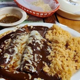 Friday special. Chicken mole enchiladas plate with double rice and tea. Friday special. Chicken mole enchiladas plate with double rice and tea.