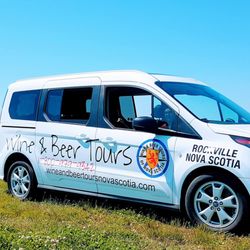 Wine & Beer Tours of Nova Scotia - Tour Van in the middle of Wolfville Vineyards
