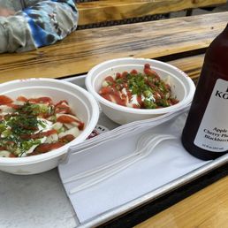 Beef Pelmeni, Potato Vareniki and a bottle of Fruit Kompot made from Apples, Cherries, Plums and Blackberries.