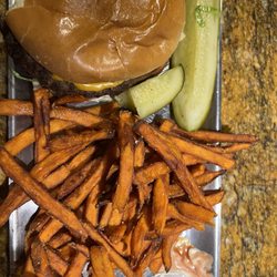 Bonnie & Clyde's Bar & Grill - Cheeseburger and sweet potato fries.