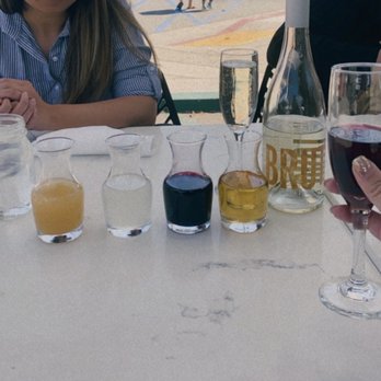 Toast Kitchen & Bar - Bottomless mimosa juices. Guava, coconut, blueberry (MY FAVORITE), peach and later added cranberry juice ( 2nd favorite) - Breakfast & Brunch Near Me - Brea, California