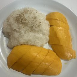 Mango coconut sticky rice was so tasty. The mango itself is in season and was perfect. The rice was soft and warm. Mango coconut sticky rice was so tasty. The mango itself is in season and was perfect. The rice was soft and warm.