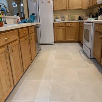 ACED Renovations - a kitchen with a white tile floor - Painters Near Me - Port Richey, Florida ACED Renovations - a kitchen with a white tile floor - Painters Near Me - Port Richey, Florida