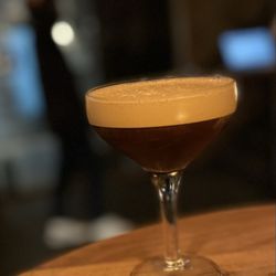 The Devil's Advocate - Double Shot with Dalmore 12, kahula, espresso shot, and Demerara.