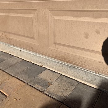 LandTeck - Part of the garage where they stained the bottom. Sloppy work. - Landscaping Near Me - Las Vegas, Nevada LandTeck - Part of the garage where they stained the bottom. Sloppy work. - Landscaping Near Me - Las Vegas, Nevada