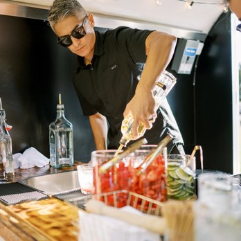 Little Boozy Mobile Bar Co - Chris in action. - Bartenders Near Me