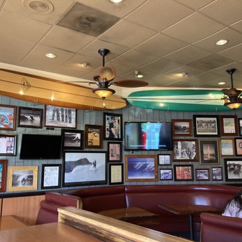 Pizza My Heart - a surfboard hanging from the ceiling - Pizza Near Me - Mountain View, California Pizza My Heart - a surfboard hanging from the ceiling - Pizza Near Me - Mountain View, California