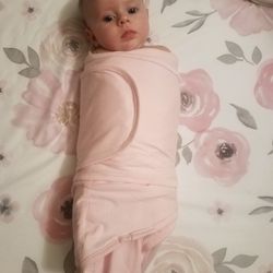 Elite Baby Services - A proper swaddle