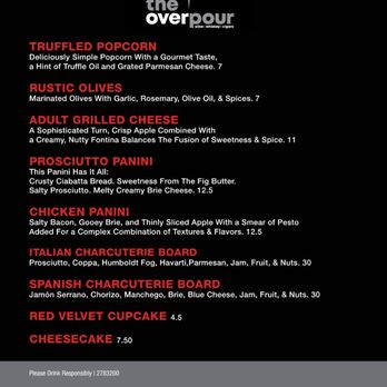 The Overpour - Menu - The menu from The Overpour includes a selection of appetizers, charcuterie boards, and desserts. Items listed are truffled popcorn, marinated olives, adult grilled cheese, prosciutto panini, chicken panini, Italian and Spanish charcuterie boards, red velvet cupcake, and cheesecake. Prices range from $4.50 to $30. The menu emphasizes gourmet snacks, cheese, and desserts, with descriptions of ingredients and flavor profiles. - Cigar Bars Near Me - El Paso, Texas