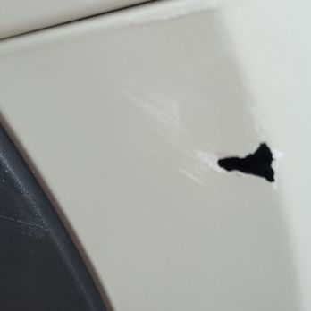 Mobile Auto Body - Front passenger side bumper damaged. Pulling car out of garage & got too close to the garage opening. I tried touch up paint. - Body Shops Near Me - Plano, Texas Mobile Auto Body - Front passenger side bumper damaged. Pulling car out of garage & got too close to the garage opening. I tried touch up paint. - Body Shops Near Me - Plano, Texas