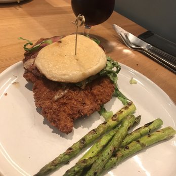 Liberty Street Kitchen - Cuban Cuban Style Pork Tenderloin Sandwich with a side of asparagus. - Comfort Food Near Me - Pella, Iowa