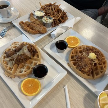 MKT Bar - Cod and fries, chicken and waffles, black pepper waffle with braised lamb shank - New American Near Me - Houston, Texas MKT Bar - Cod and fries, chicken and waffles, black pepper waffle with braised lamb shank - New American Near Me - Houston, Texas