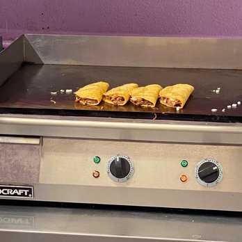 Neveria Y Taqueria Yesi - a hot dog on a grill - Tacos Near Me - Phoenix, Arizona Neveria Y Taqueria Yesi - a hot dog on a grill - Tacos Near Me - Phoenix, Arizona