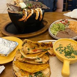 Tapatio's Restaurante Mexicano - Tacos gobernator with shrimp, the sauce  malcaljete was awesome  dining room had been remodeled.  It is beautiful.