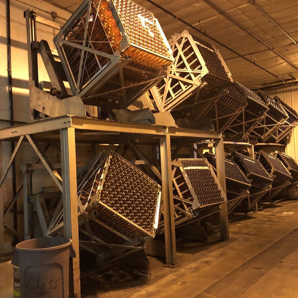 Gruet Winery - Automated riddling racks at Gruet consolidate sediment more efficiently and consistently than antiquated hand riddling. - Wineries Near Me - Albuquerque, New Mexico Gruet Winery - Automated riddling racks at Gruet consolidate sediment more efficiently and consistently than antiquated hand riddling. - Wineries Near Me - Albuquerque, New Mexico