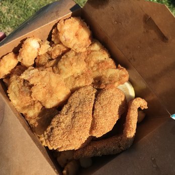 Basa Seafood Express - Fried oysters, fish and shrimp over crinkle fries. Comes with tartar sauce. Delicious! - Seafood Near Me - San Francisco, California