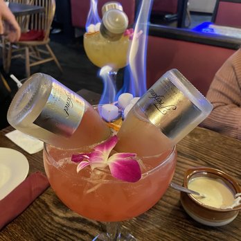 Flaming Margaritas - Peach champagne and strawberry champagne margaritas. Both medium. - Mexican Near Me - Branson, Missouri Flaming Margaritas - Peach champagne and strawberry champagne margaritas. Both medium. - Mexican Near Me - Branson, Missouri