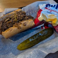 Magerks Pub - Cheesesteak in half