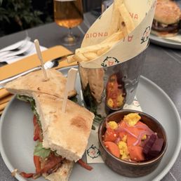My coworker ordered Aiona Verdure with eggplant, pepper, onion, tapenade on focaccia with fries.