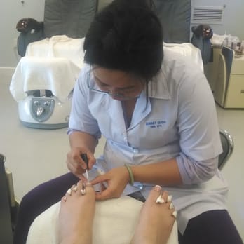 Sunset Glow Nail Spa - A French Manicure with a white bowtie and silver glitter accent. - Nail Salons Near Me - San Clemente, California Sunset Glow Nail Spa - A French Manicure with a white bowtie and silver glitter accent. - Nail Salons Near Me - San Clemente, California
